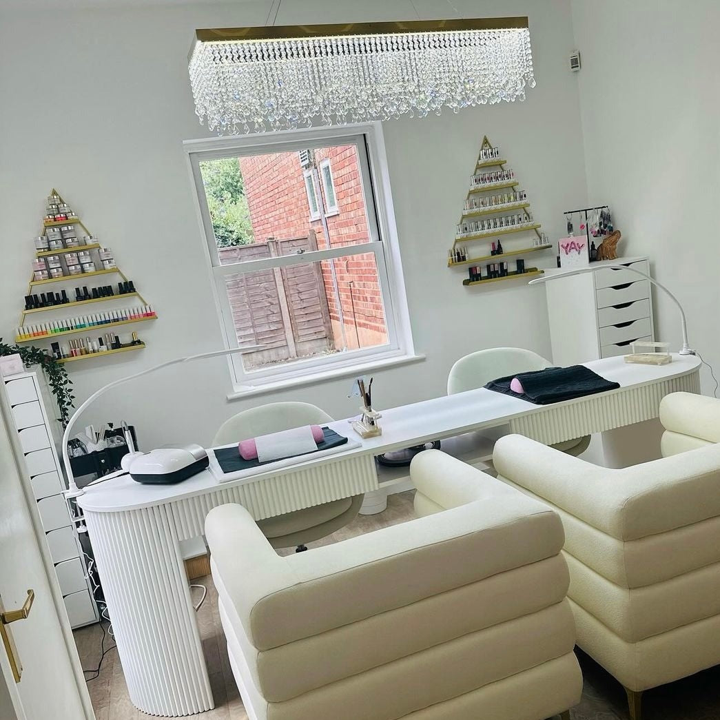 VORELLI® Modesto modern rectangular chandelier installed in contemporary living room with layered crystal chains