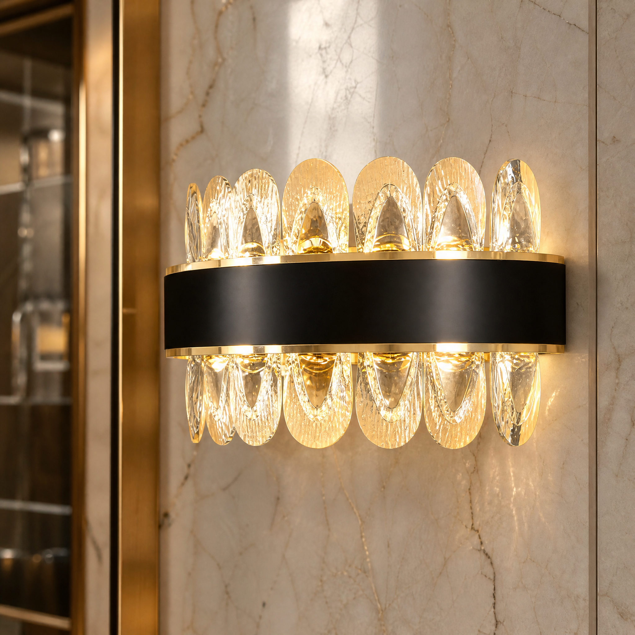 A macro closeup view of the VORELLI Monte-Carlo Wall Light, showcasing the exquisite craftsmanship and intricate details of its textured oblong crystals.