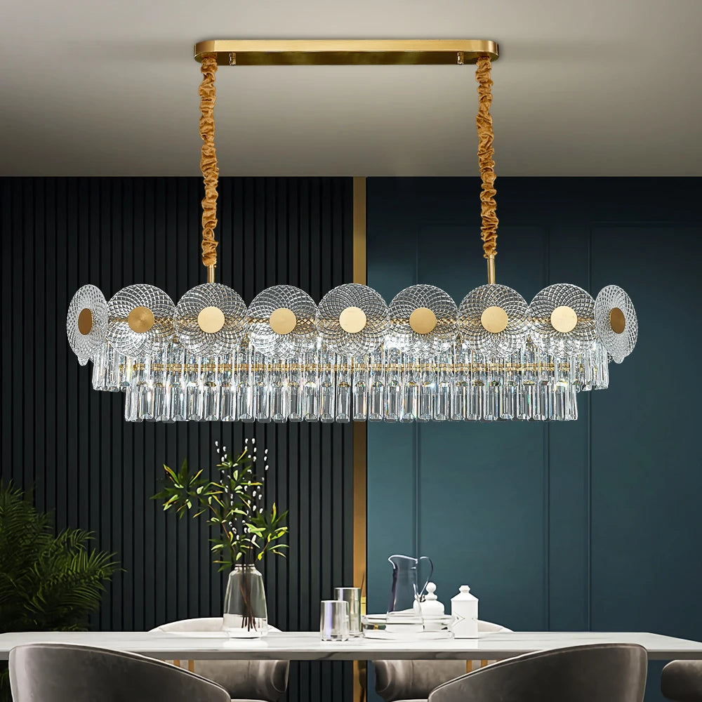 VORELLI® Morandi rectangular crystal chandelier suspended above dining table with patterned glass disc detailing