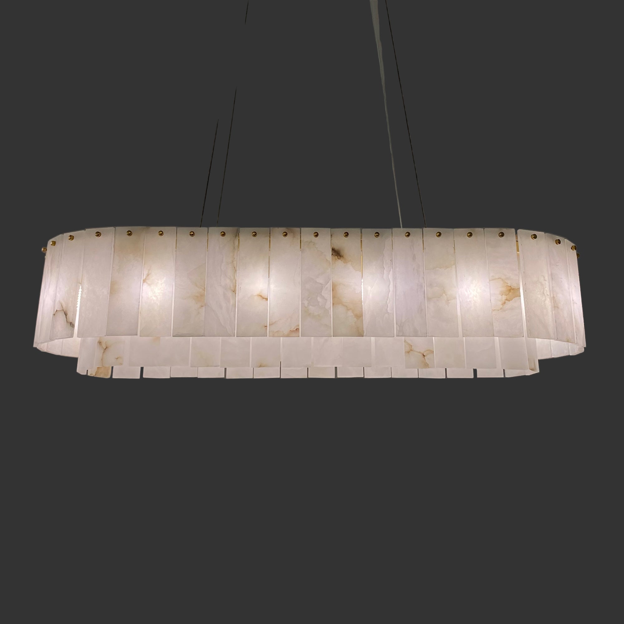 VORELLI® Munro luxury marble rectangular chandelier suspended above dining space creating refined ambient glow