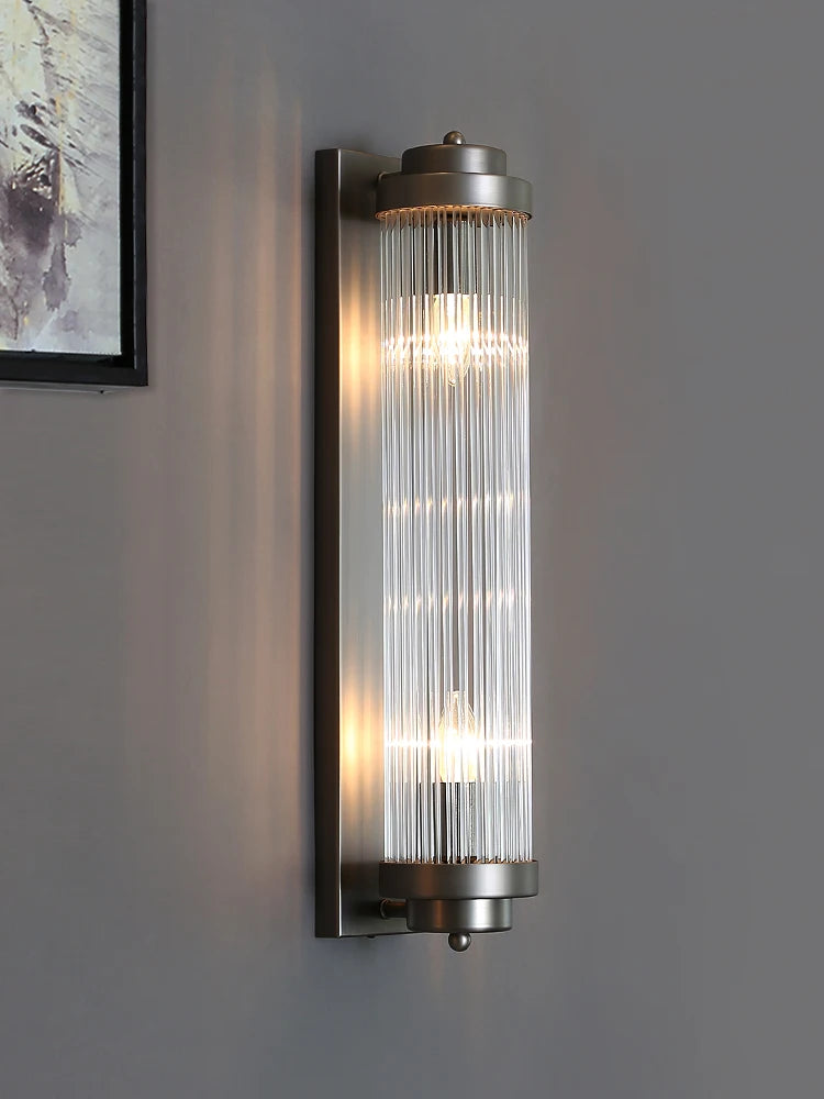 VORELLI® Mykonos crystal wall light installed beside mirror in elegant bathroom interior