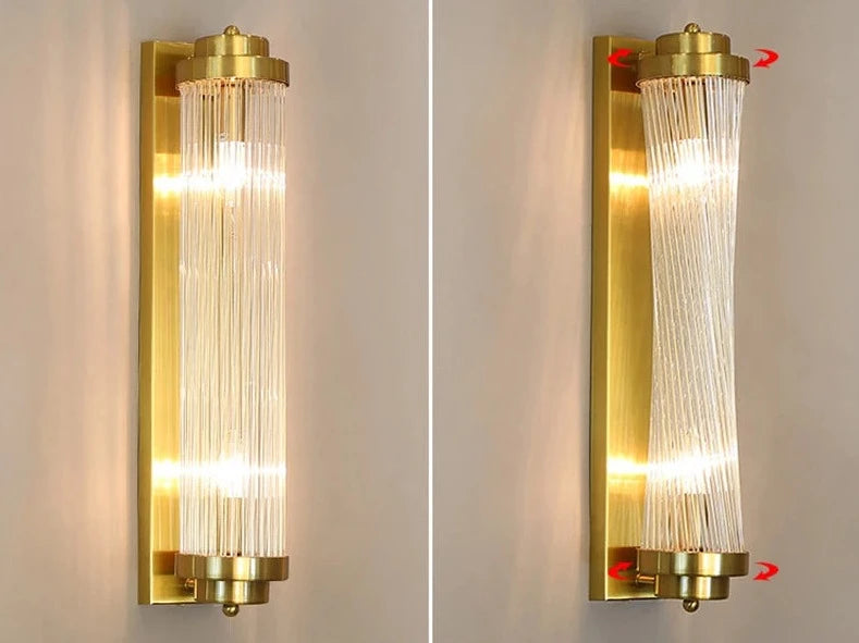 Close up of VORELLI® Mykonos cylindrical crystal wall light highlighting vertical glass tubes and structured frame detailing