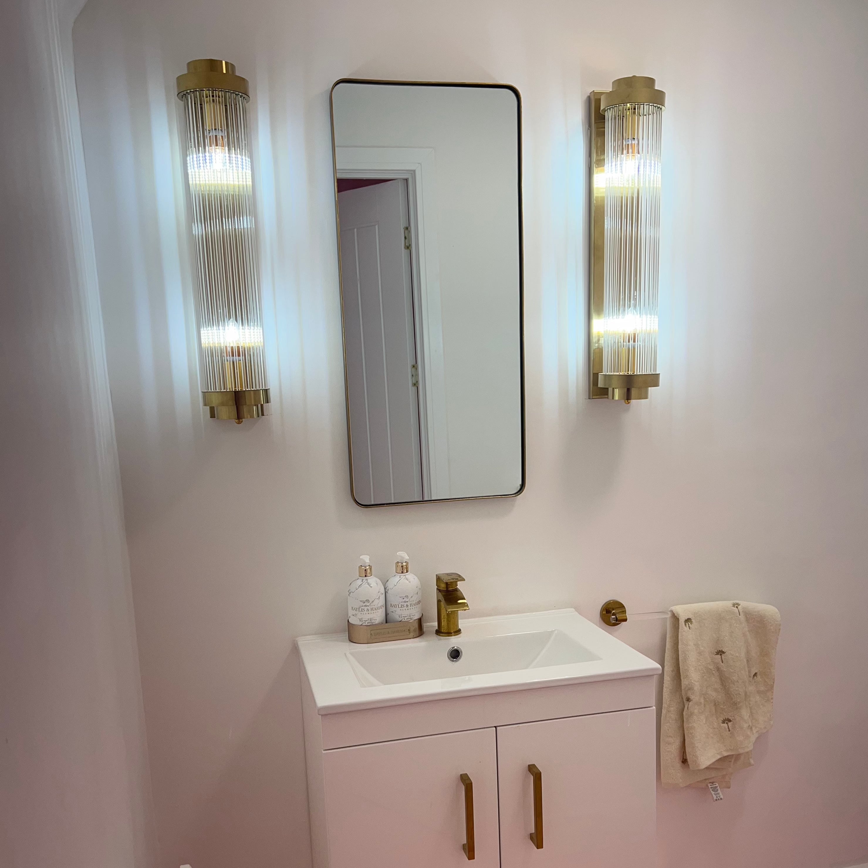 VORELLI® Mykonos cylindrical crystal wall light illuminating refined hallway space