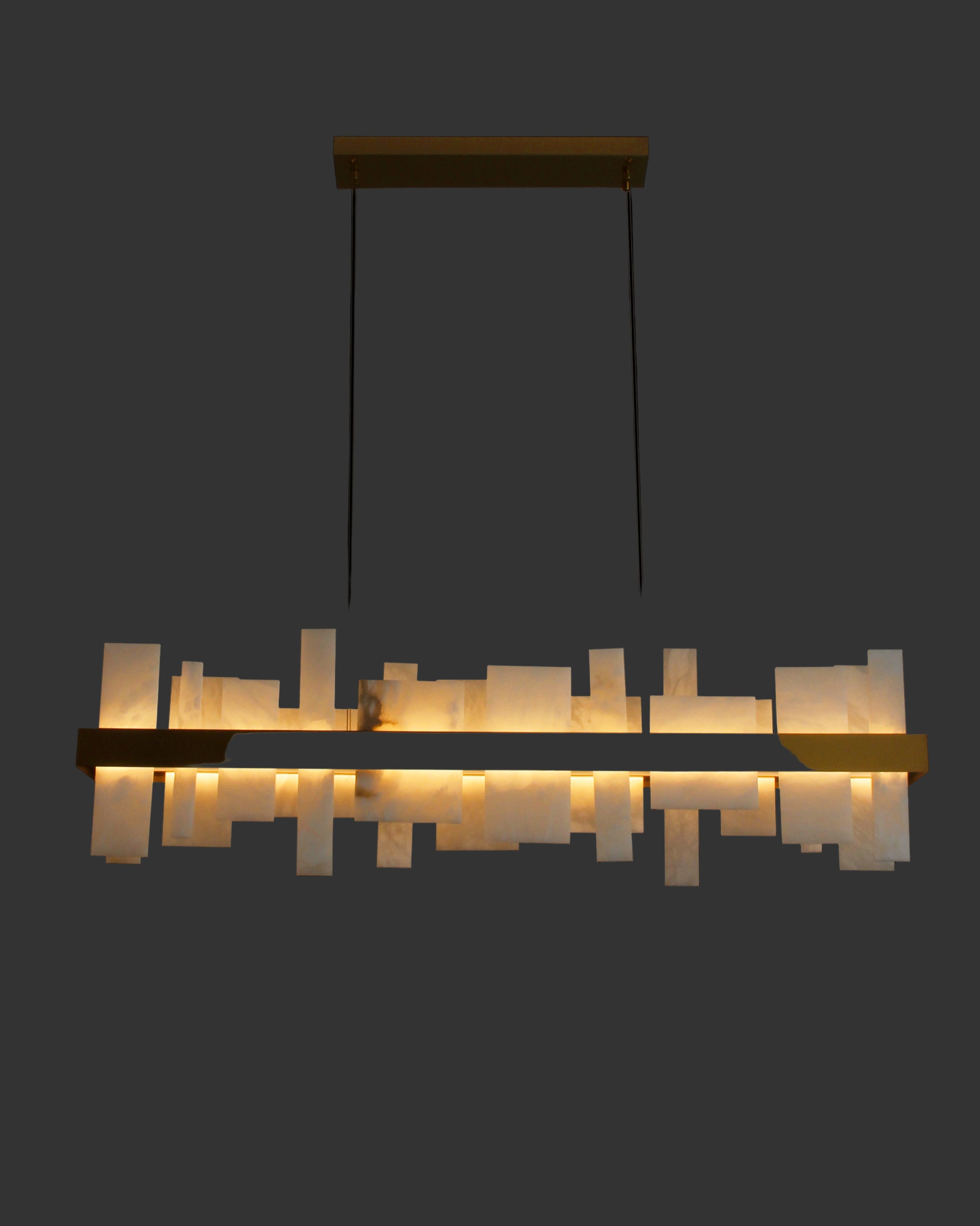 VORELLI® Niva designer marble chandelier enhancing modern luxury interior with structured stone panels