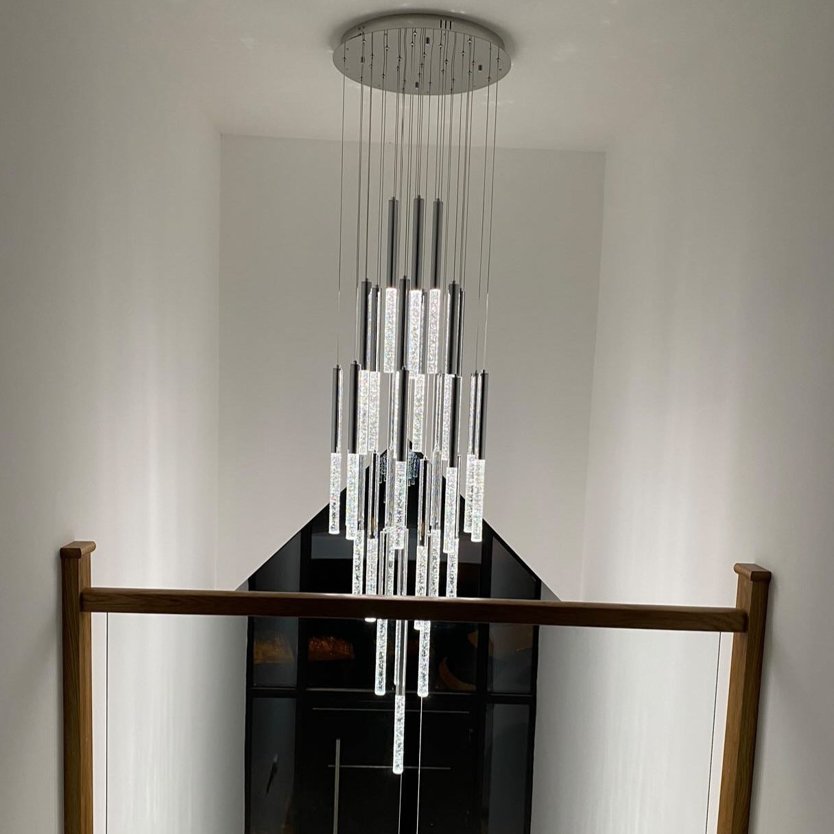VORELLI® Nyon luxury staircase chandelier enhancing architectural stairwell with cascading crystal pendants