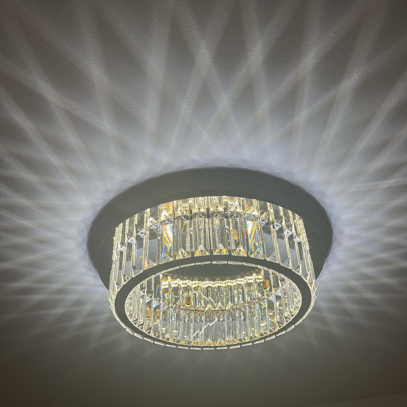 VORELLI® Oia designer crystal ceiling light enhancing refined interior with circular perimeter crystal bars