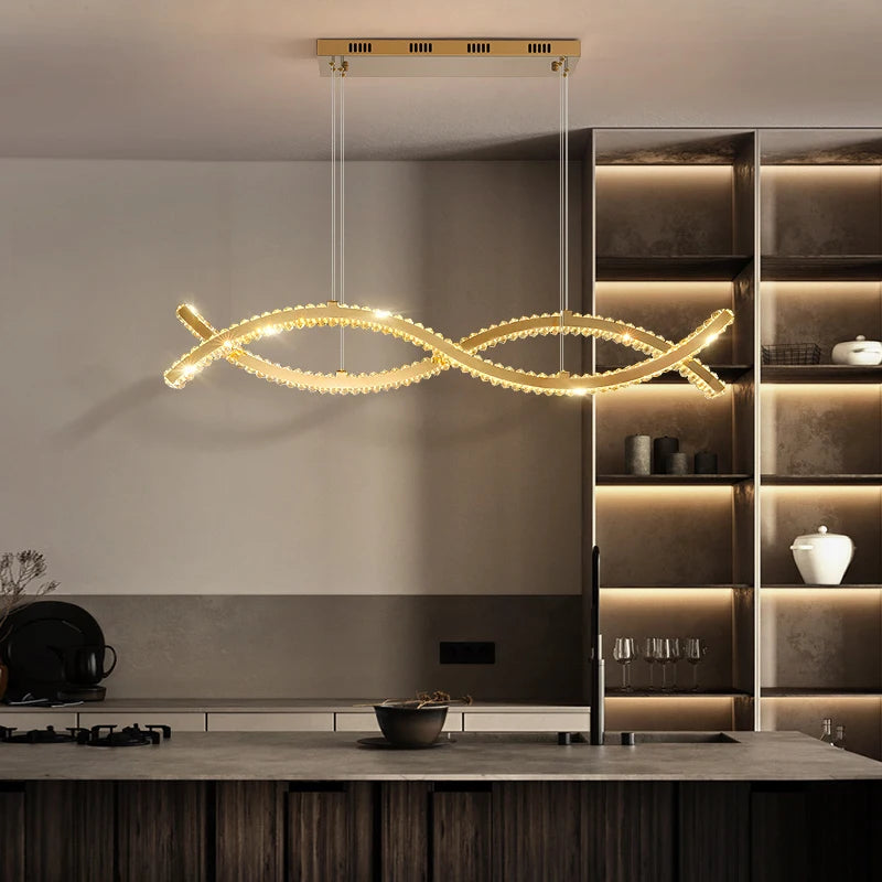 VORELLI® Oia luxury wave chandelier suspended above contemporary space with sculptural crystal design