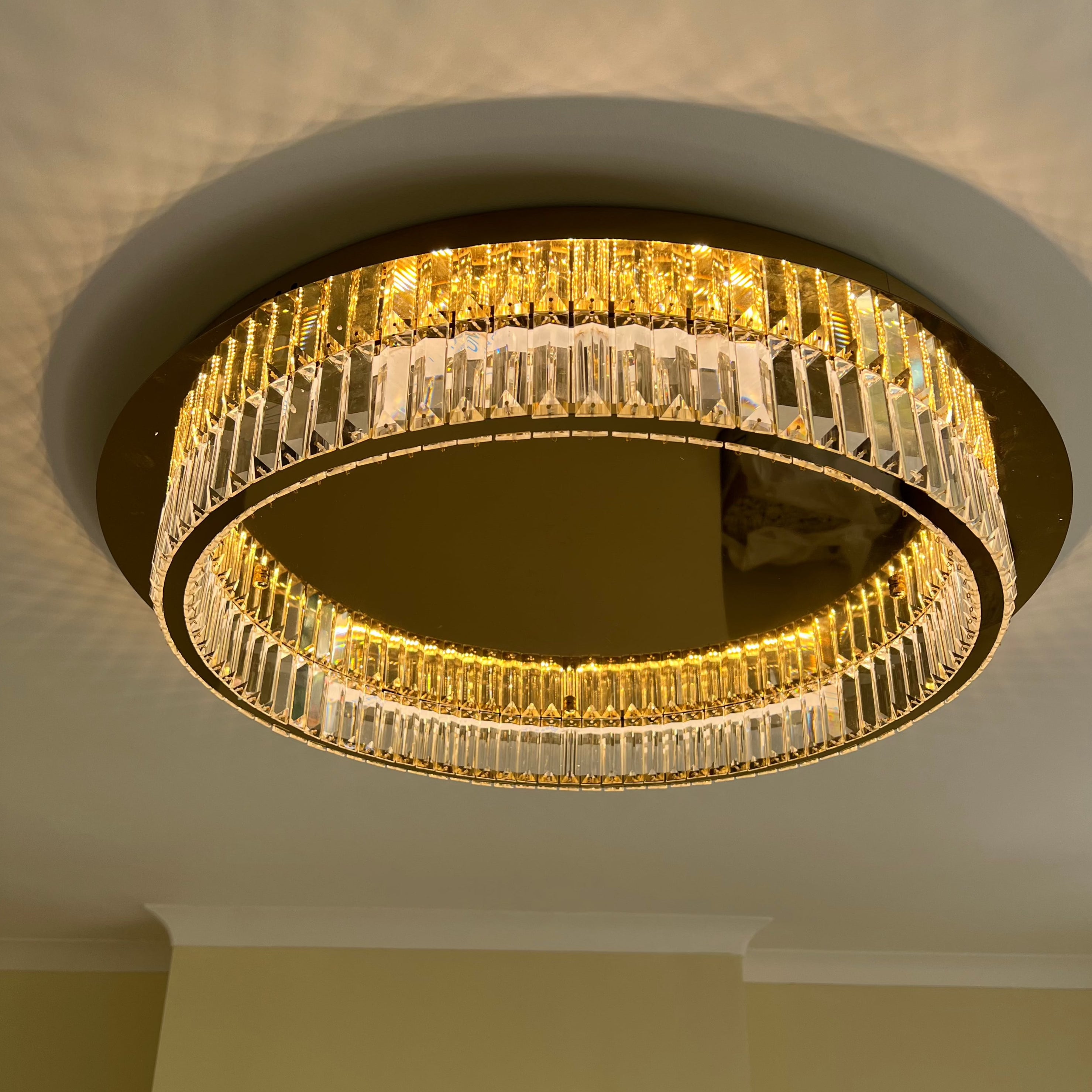 VORELLI® Oia modern flush crystal ceiling light casting patterned illumination across ceiling surface