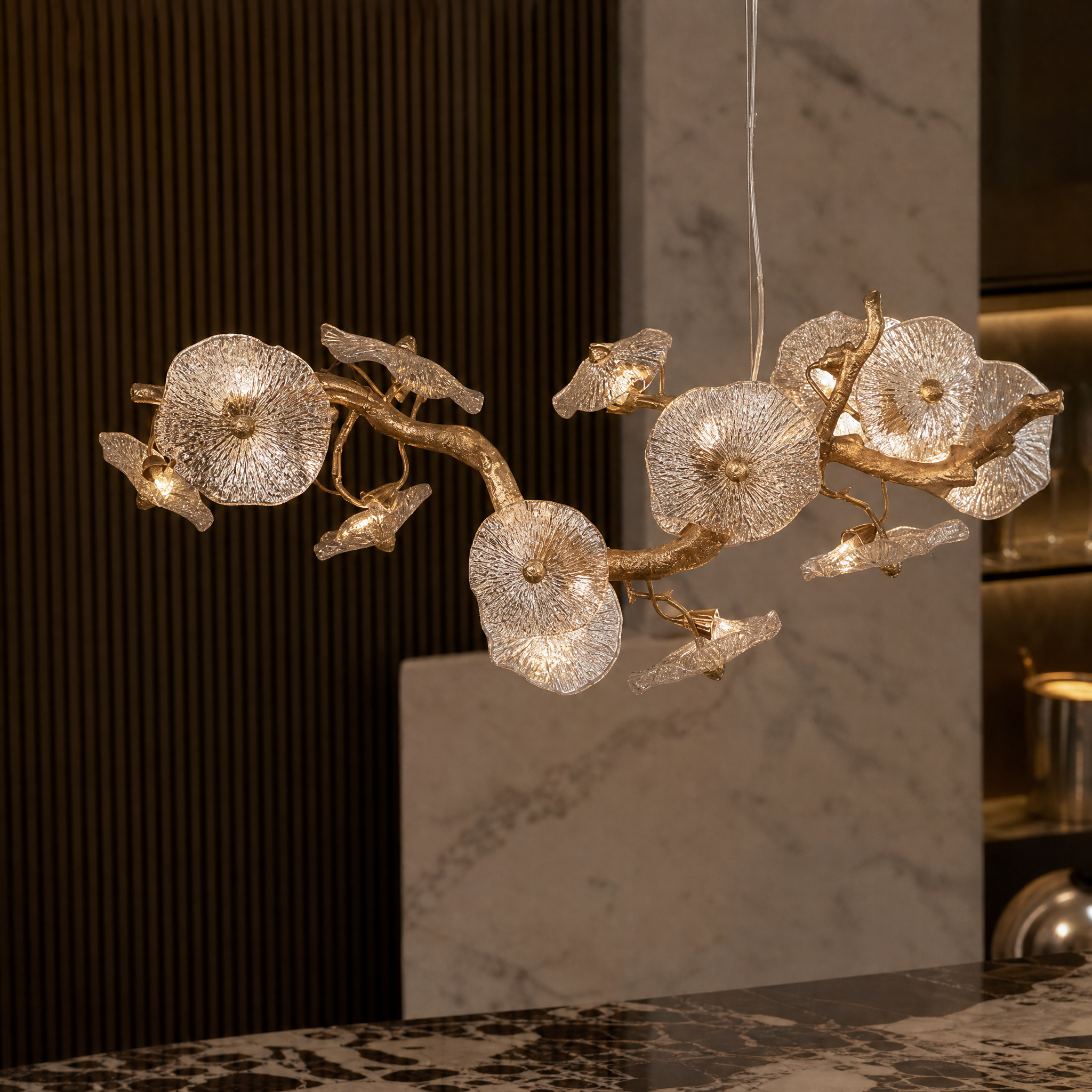 Close-up of VORELLI Penny Leaf Rectangular Chandelier showcasing sculpted glass leaves and delicate branch details