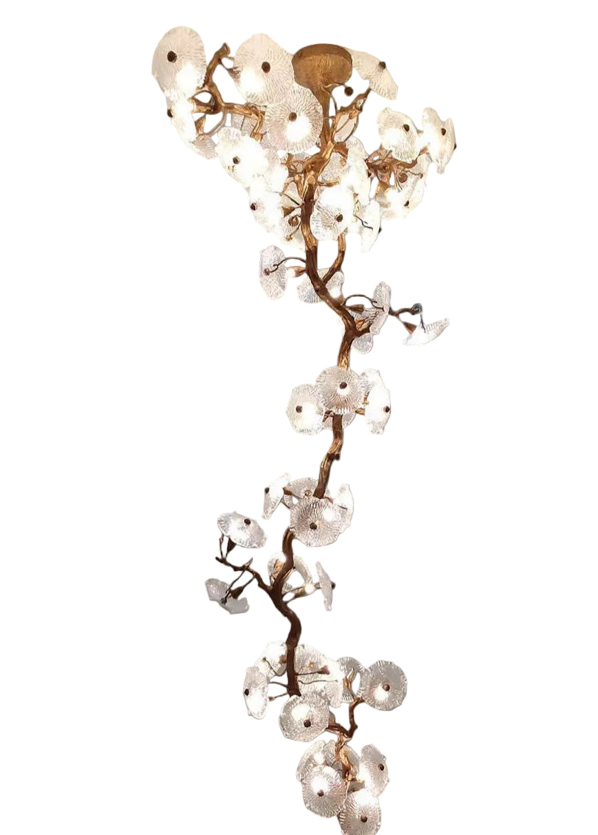 Penny Leaf linear staircase chandelier with sculptural glass leaves by VORELLI®