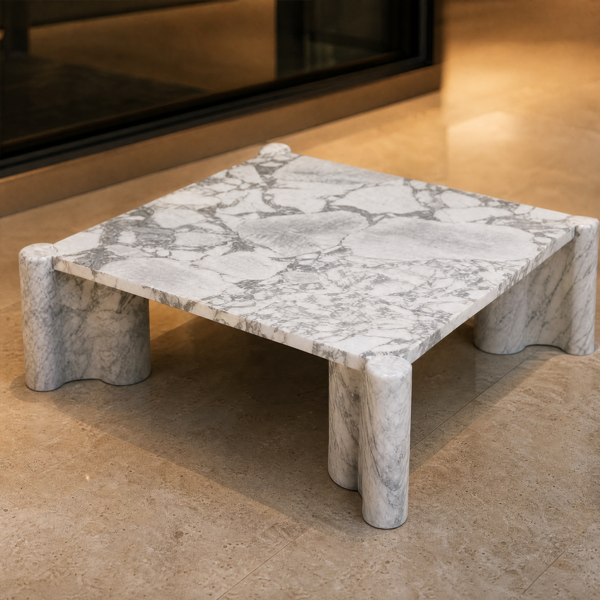 Macro closeup of the striking, intricate natural grey and white patterning inherent in the Arabescato marble surface of the VORELLI Portorino square coffee table.