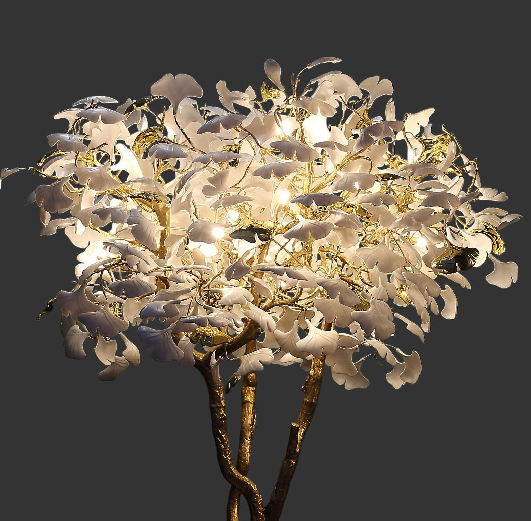 VORELLI Prano floor lamp featuring sculptural floral glass and branching metal structure