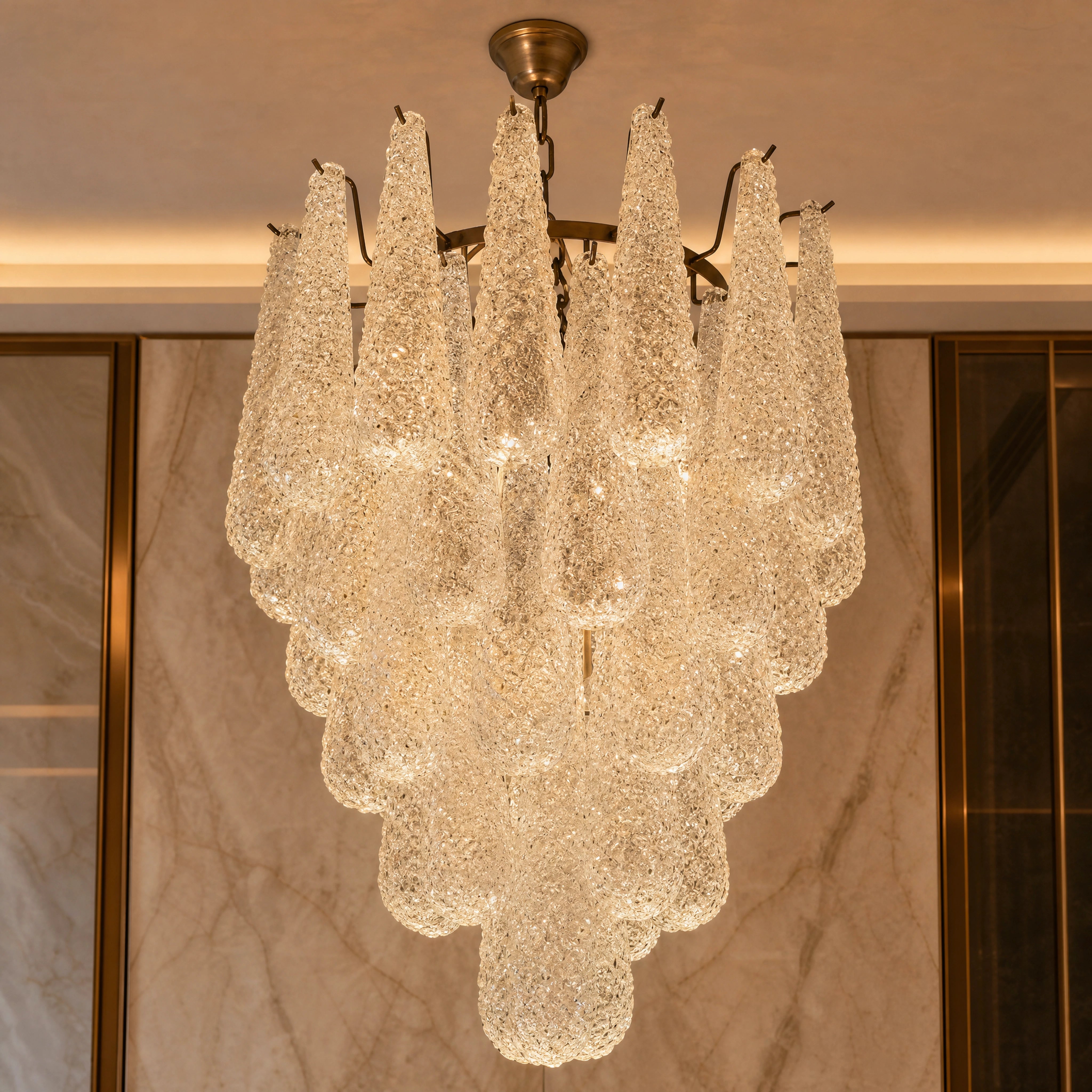 Pietrasanta Conchiglie Murano Shell Glass Circular Chandelier close-up luxury lifestyle hero image by VORELLI