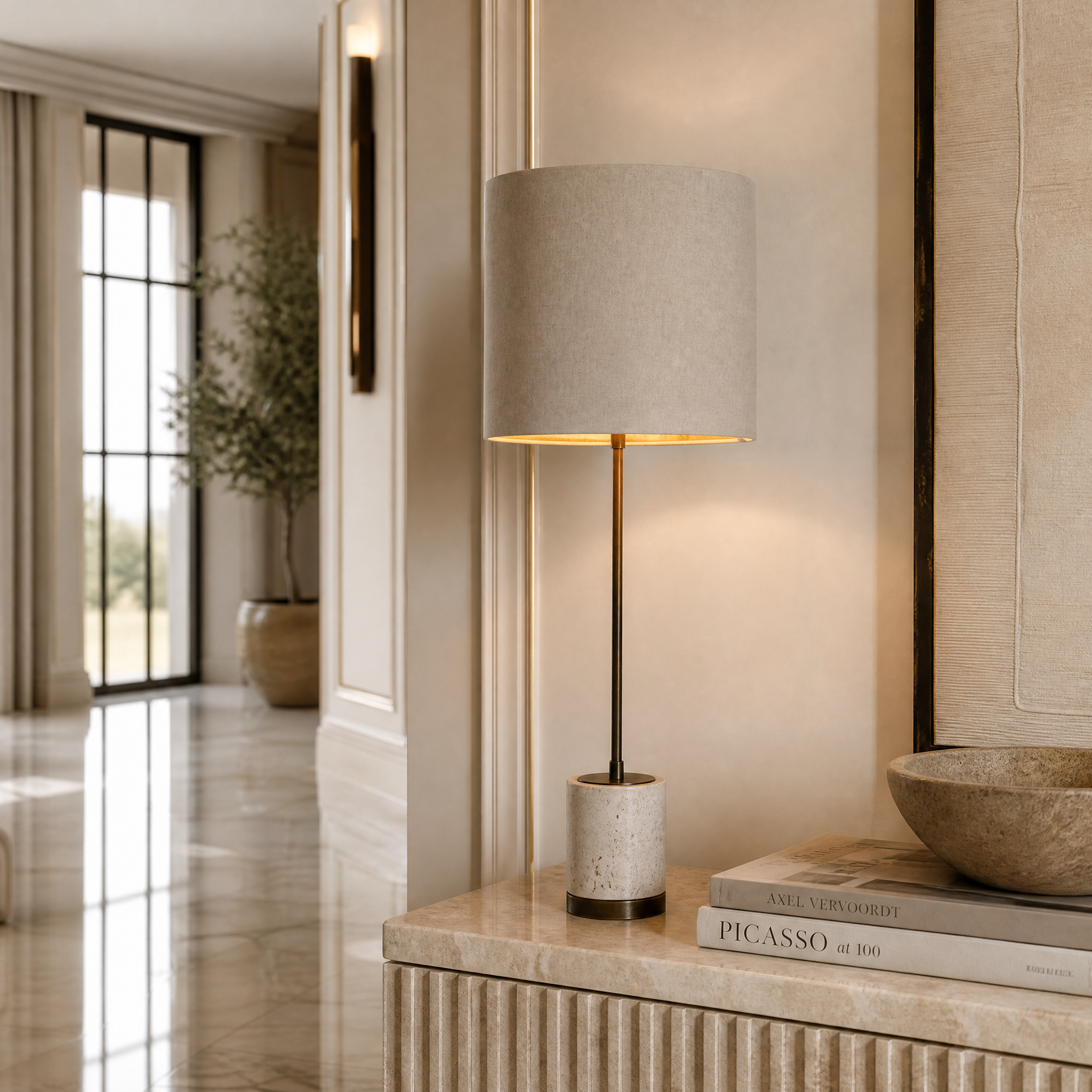 VORELLI Valmere H71 brass table lamp with a soft linen shade on a bedside table in a luxury modern residential bedroom.