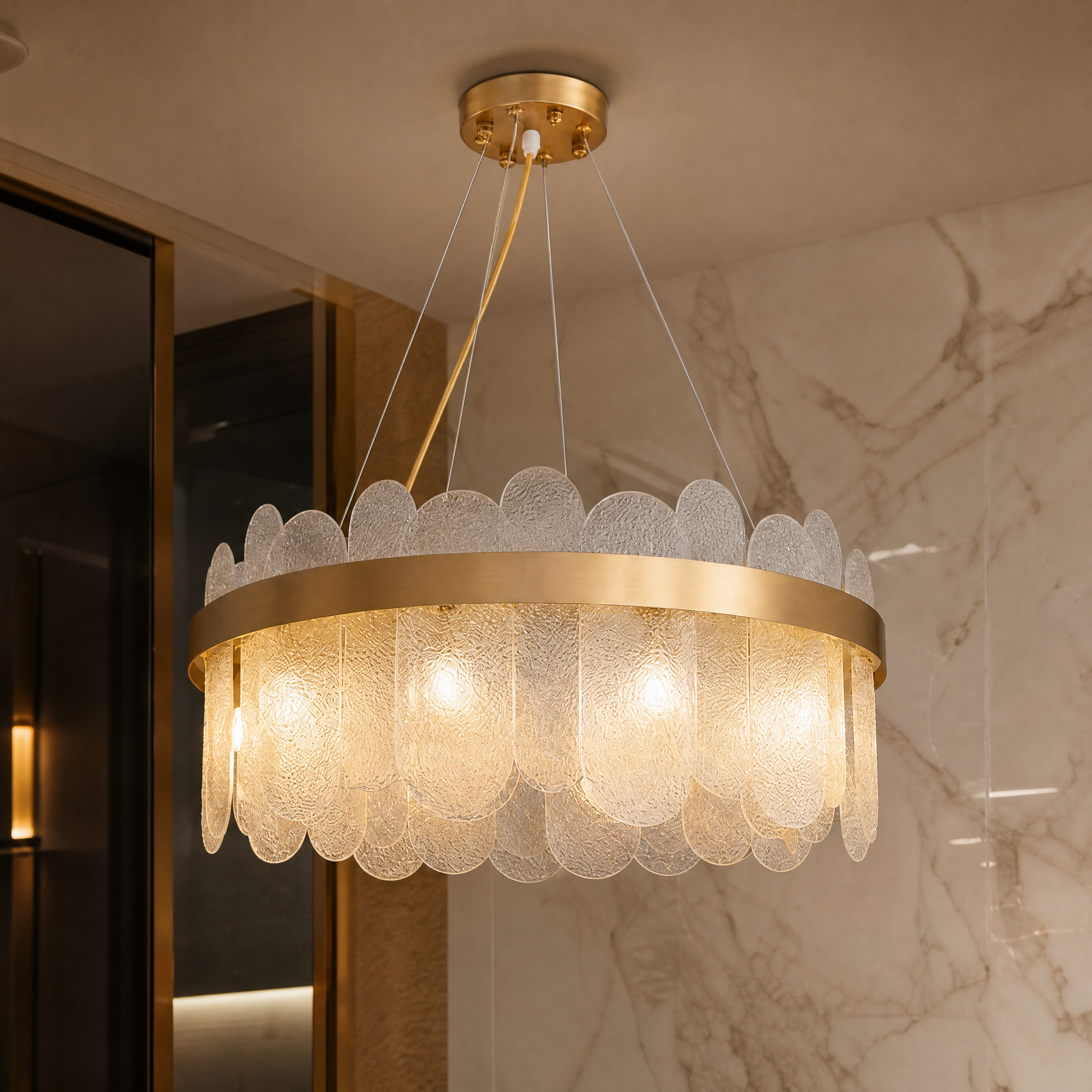 Detailed closeup of the VORELLI Valparaíso chandelier showcasing the refined texture of the number 8 brushed copper frame and elegant oblong glass elements.