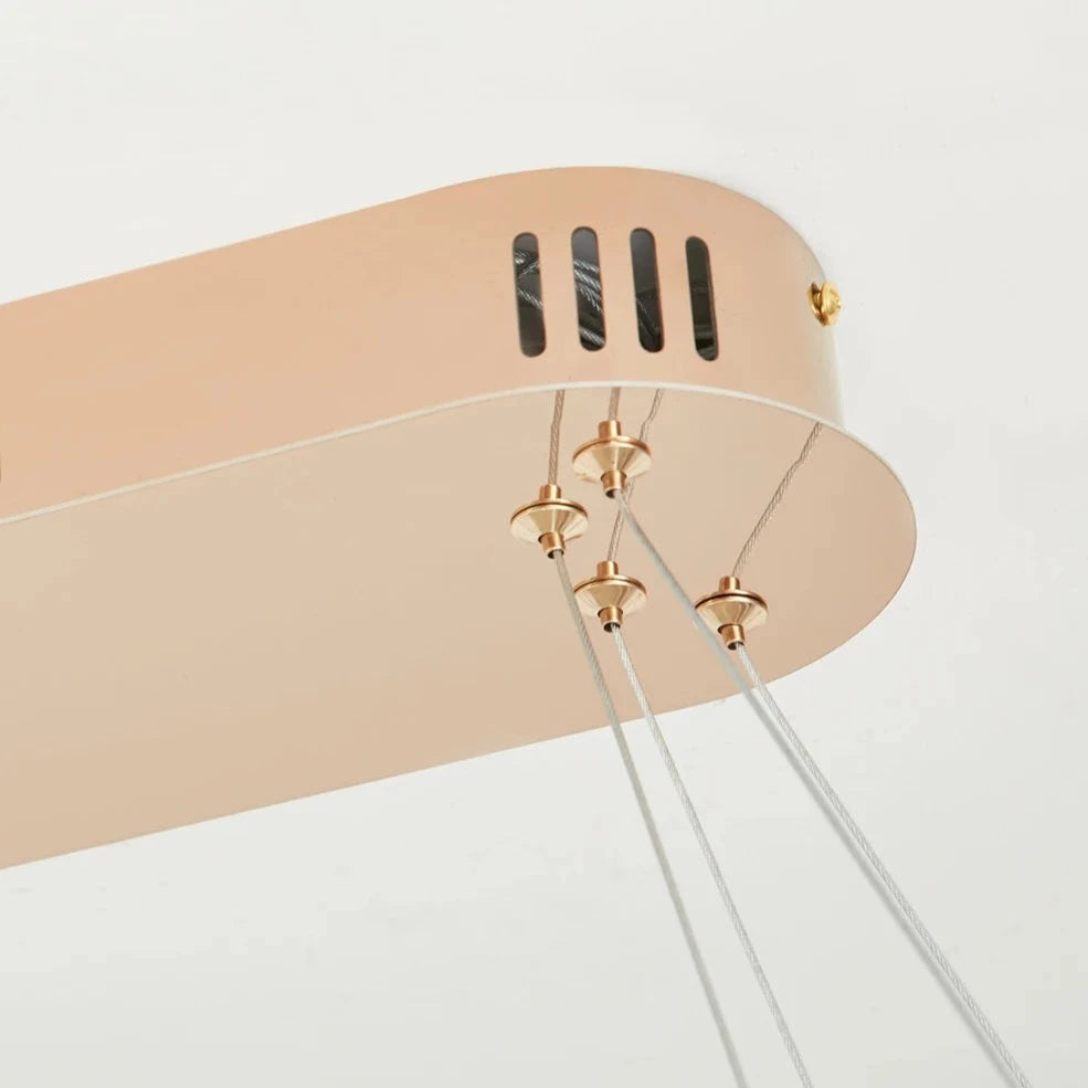 Ceiling plate and suspension wire detail of rectangular LED chandelier for clean modern installation
