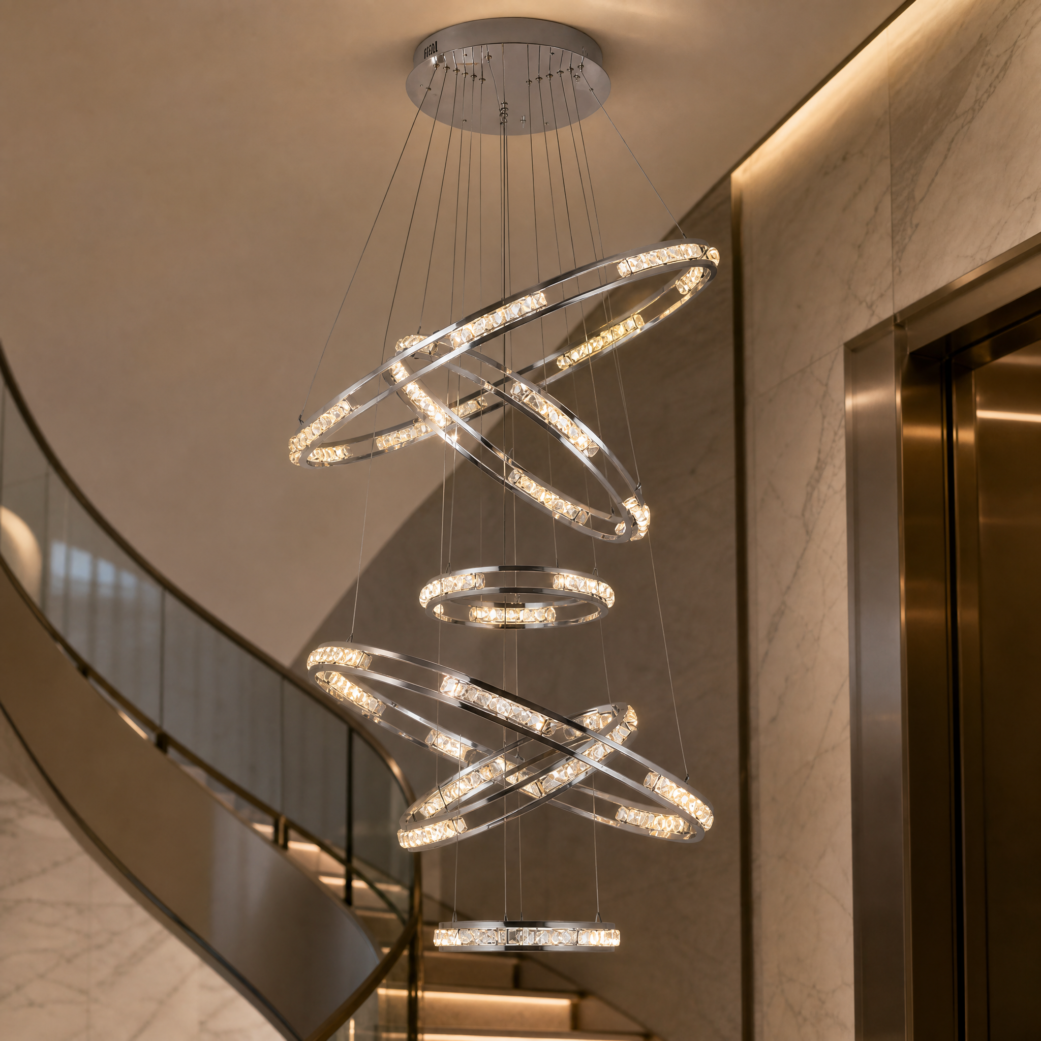 Close-up detail of the diamond-cut square crystals and sleek stainless steel frame on the VORELLI Vermacelli Ring Staircase Chandelier.