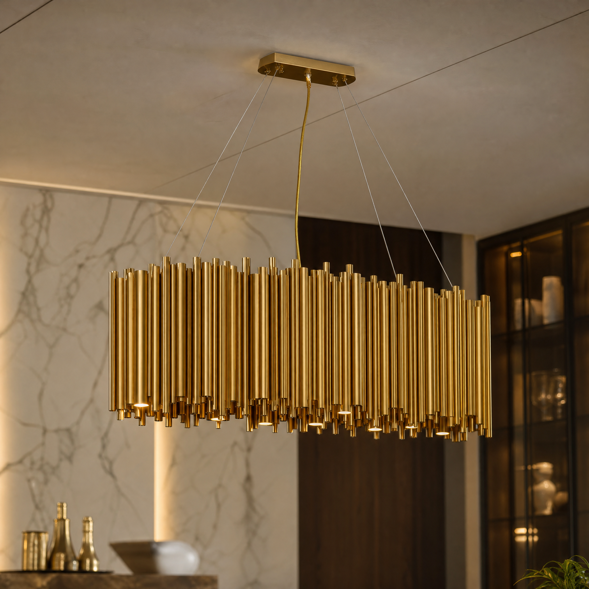 A macro close-up shot showcasing the refined texture of the brushed copper and polished stainless steel on the VORELLI® Vitacura Chandelier.