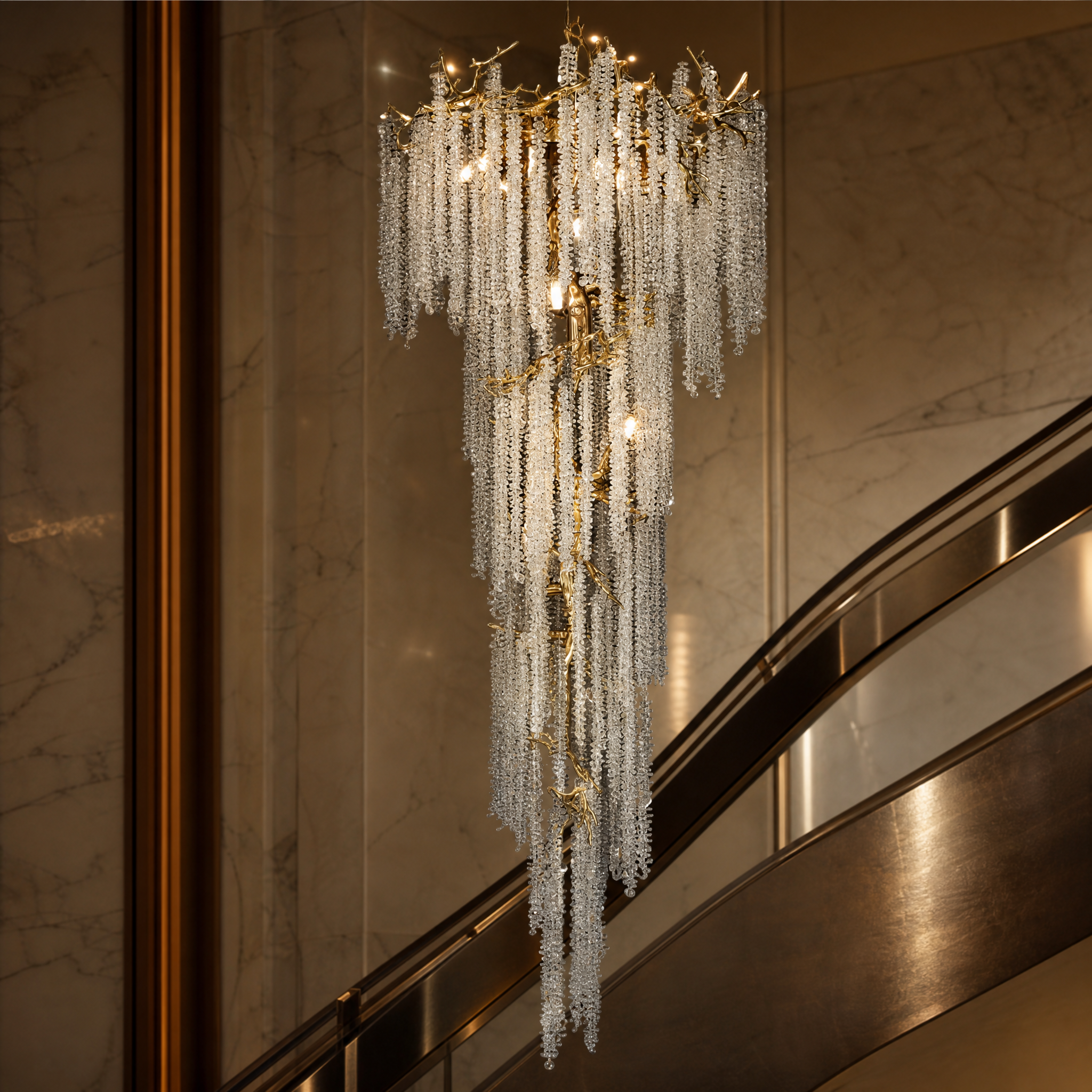 Macro closeup of the sculptural branch detailing and premium crystal strands on the Vorelli Wisteria Spiral Staircase Chandelier.