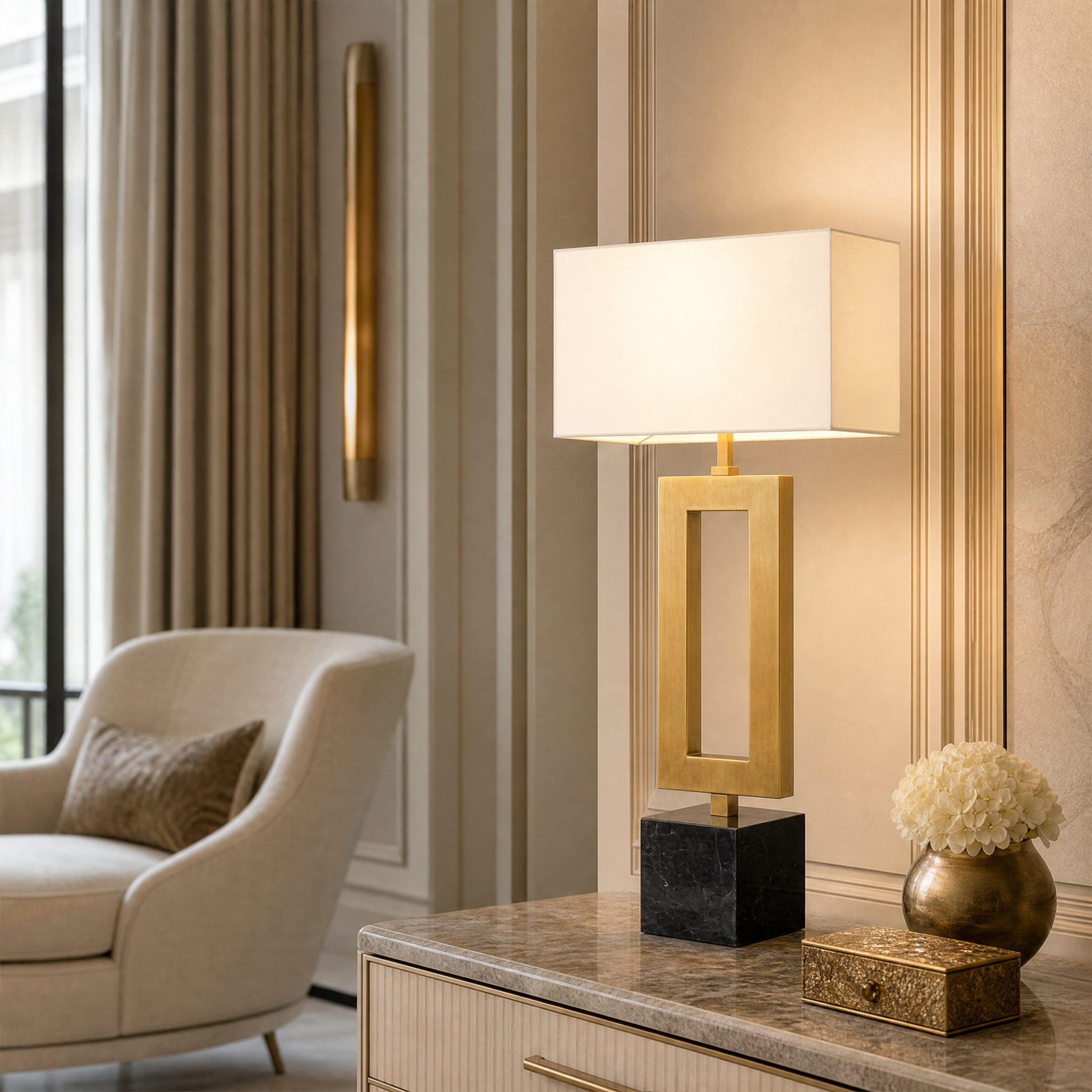 VORELLI Zavren black marble and antique brass table lamp casting a warm glow on a bedside table in a luxury modern bedroom interior.