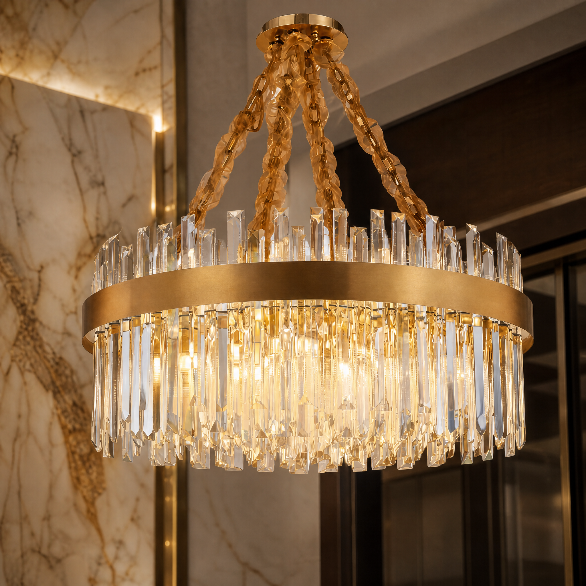 Detailed closeup of the VORELLI Williston circular chandelier showing light reflecting off the premium crystal bars and polished stainless steel frame.