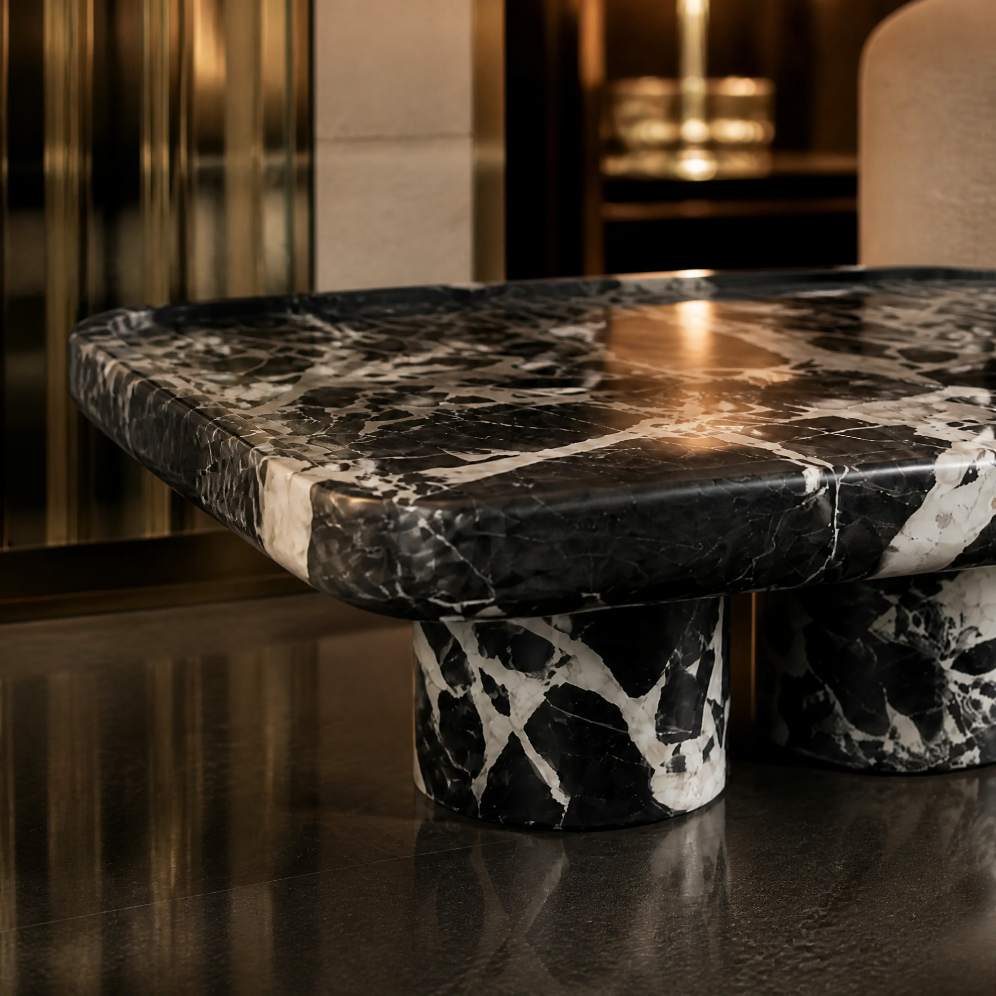 Close up detail of the intricate deep black and white veining on the Xaviero French Napoleon Black marble coffee table.