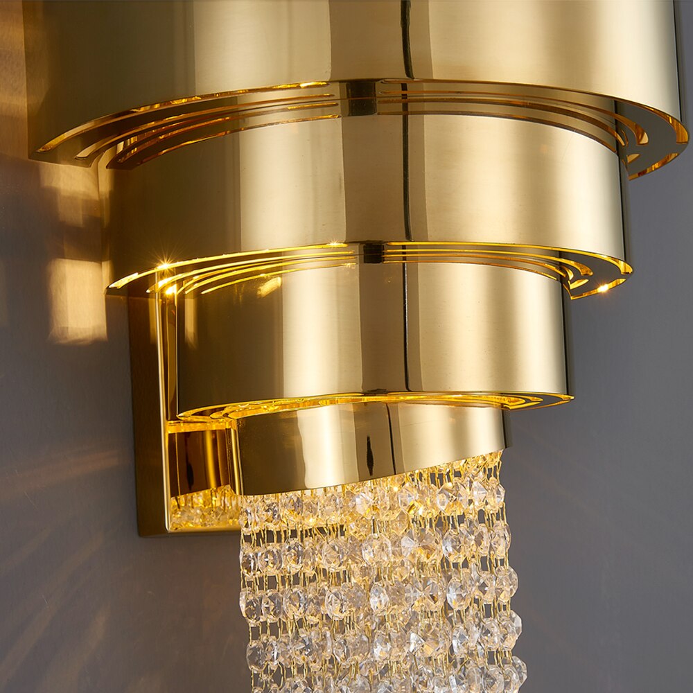 champs elysees wall light close-up titanium gold frame and crystal detailing