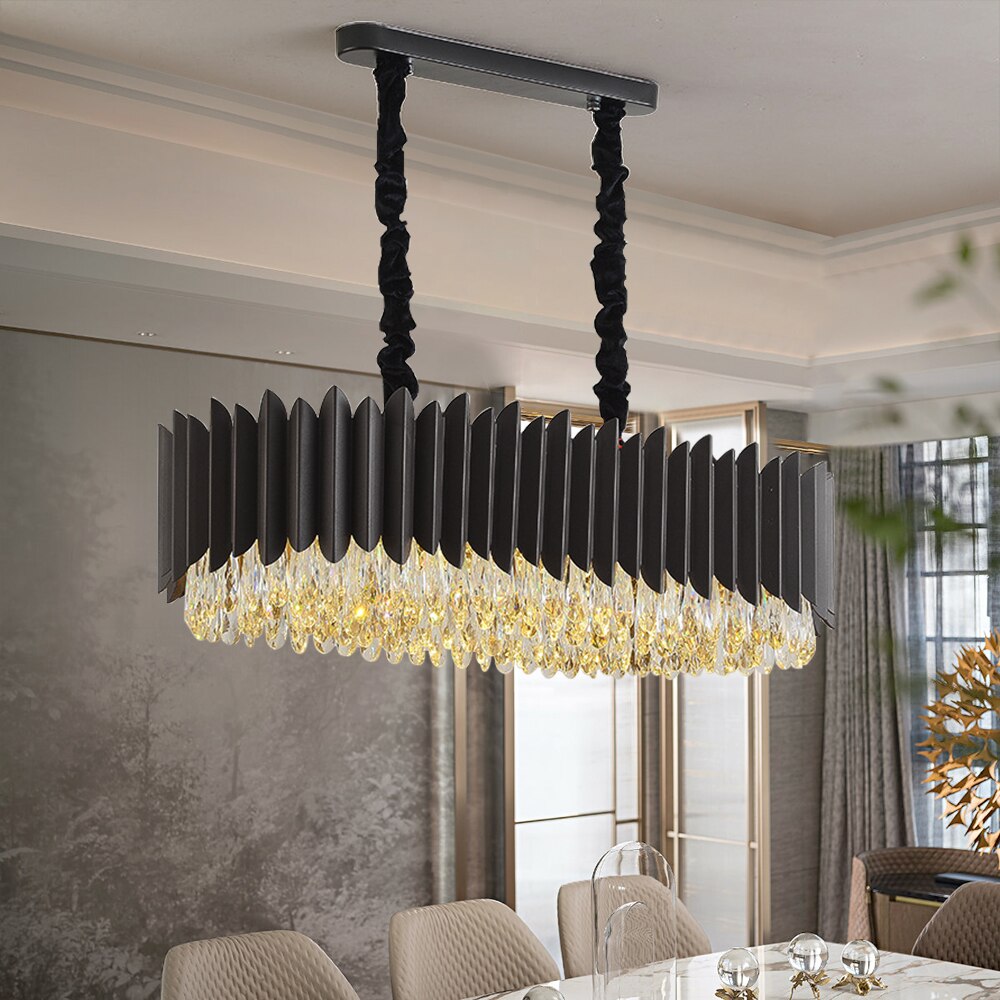 Doral Rectangular Chandelier installed above a luxury dining table with diamond cut teardrop crystals