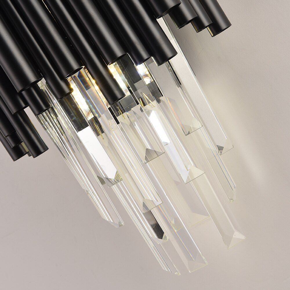 Detailed view of Gotham wall light crystal bars diffusing warm ambient light
