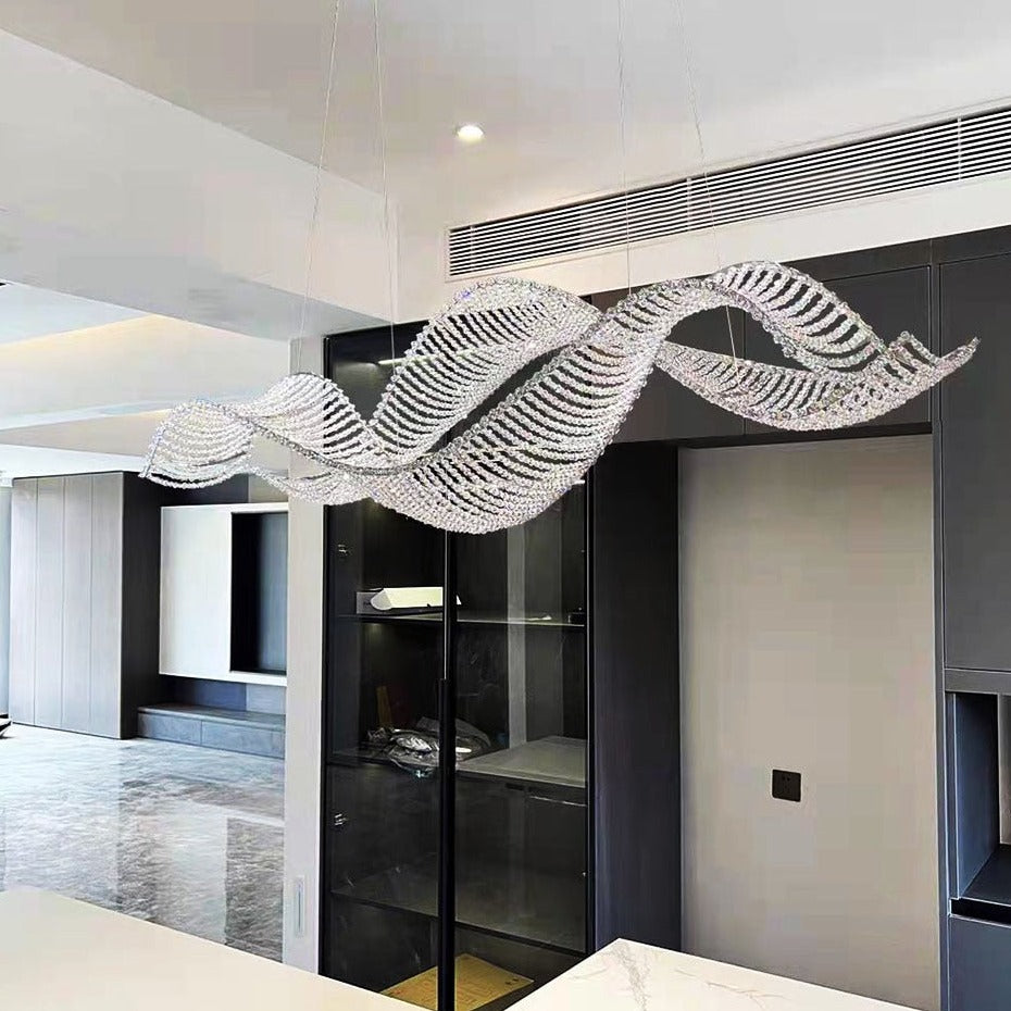 Harbron Rectangular Chandelier showcased in a contemporary interior with sculptural wave form lighting