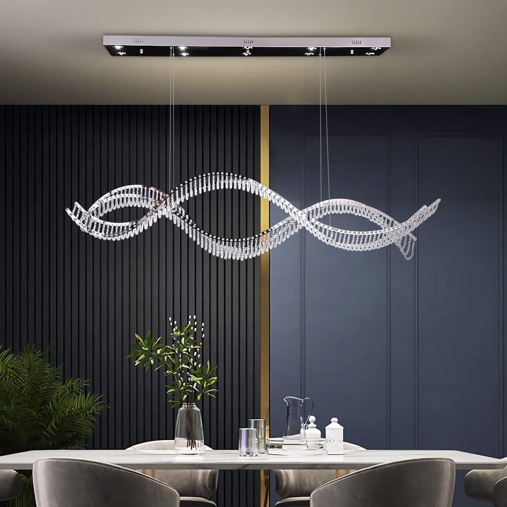 Harbron Rectangular Chandelier featuring a flowing wave design with crystal pearl detailing in a luxury interior