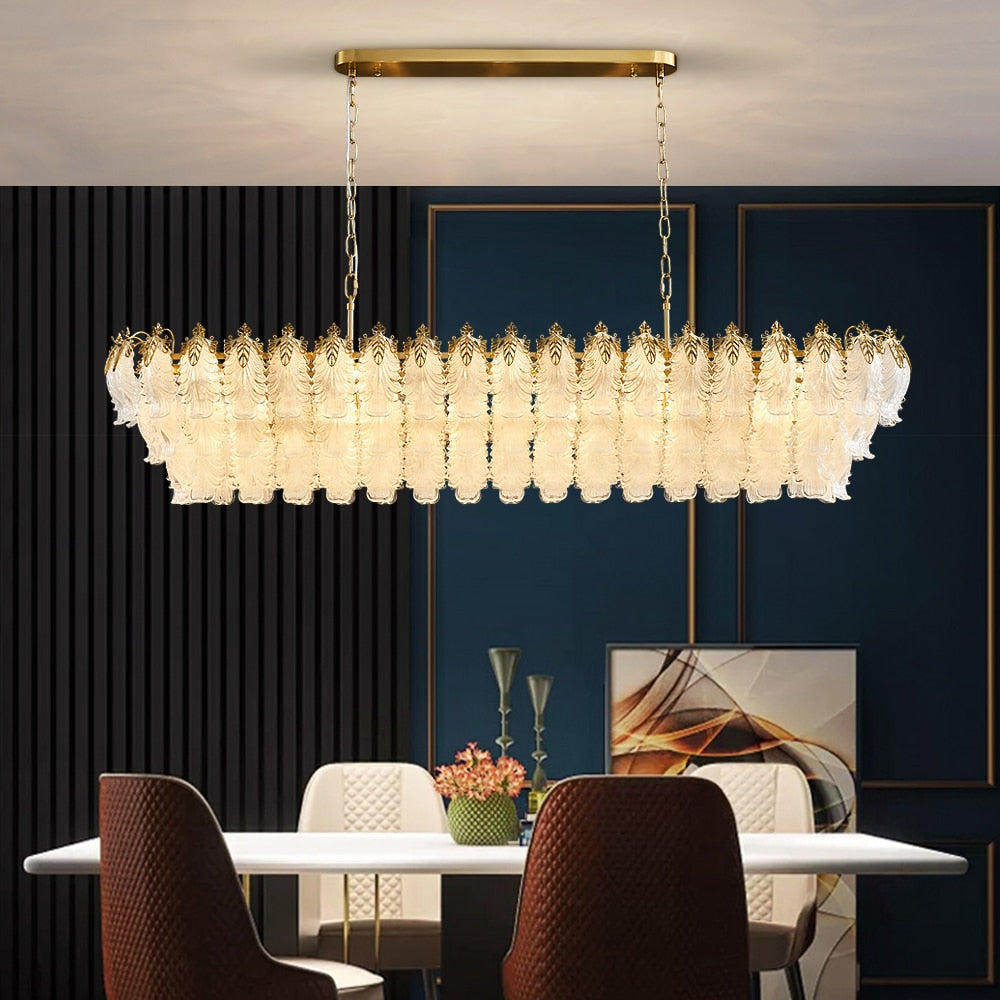 Rectangular feather crystal chandelier illuminating a refined dining room interior