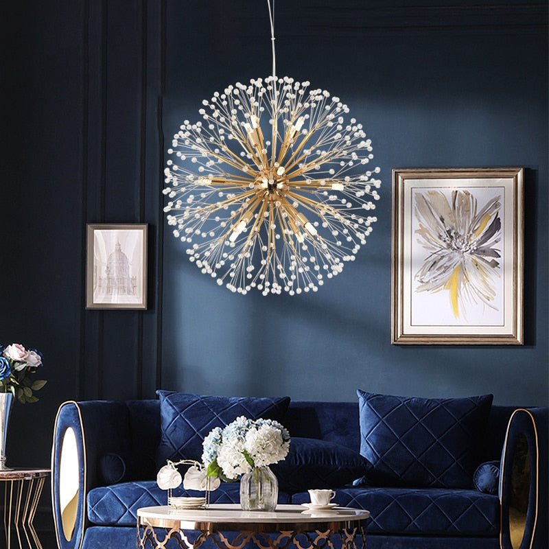 Kadupul Pendant featuring a radiating crystal starburst design suspended in a luxury living room interior