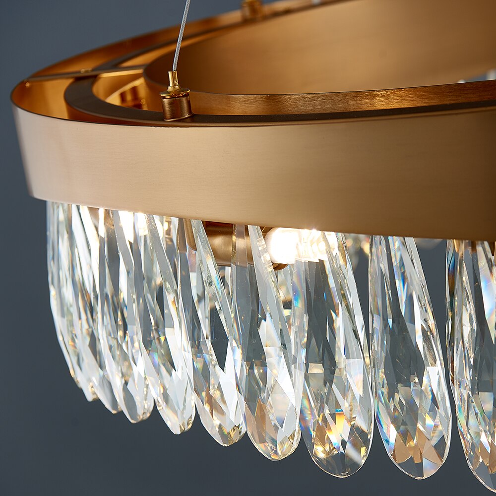Detailed close-up of diamond cut teardrop crystal elements forming a luxury rectangular chandelier