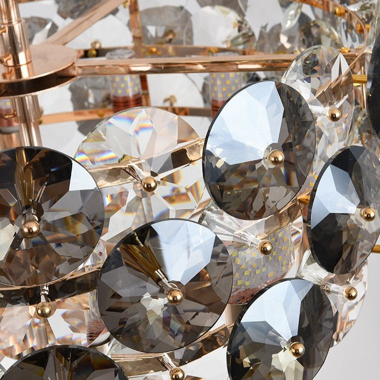 Decorative arrangement of diamond cut smoky and clear crystal discs on a modern rectangular chandelier
