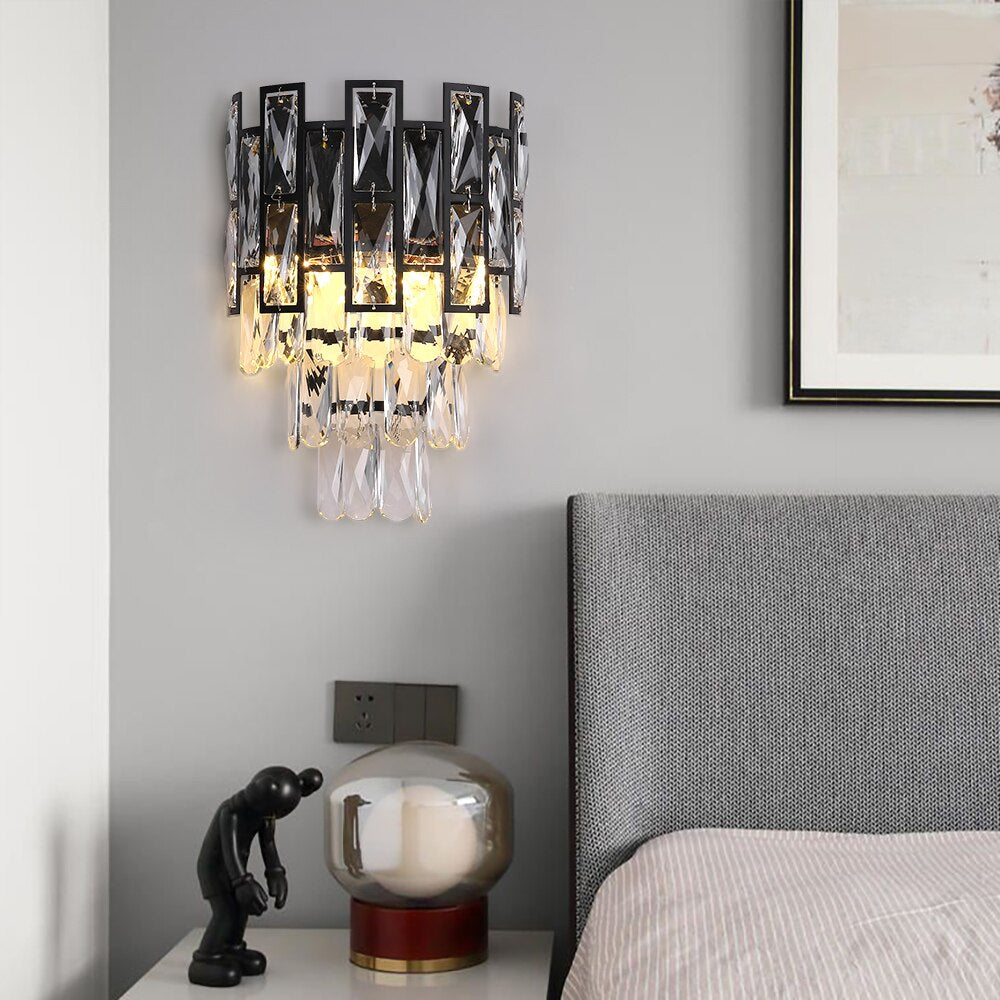 Presidio modern faceted crystal wall sconce installed in refined bedroom interior
