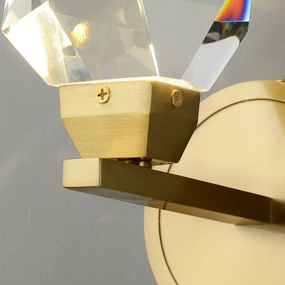 Detailed view of wall plate and crystal support structure on Runtz wall light