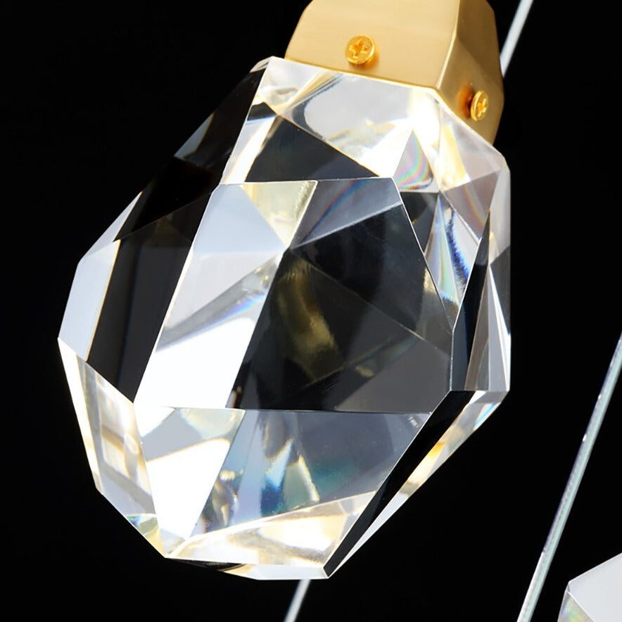 Close up of diamond cut faceted crystal drop on Runtz rectangular chandelier