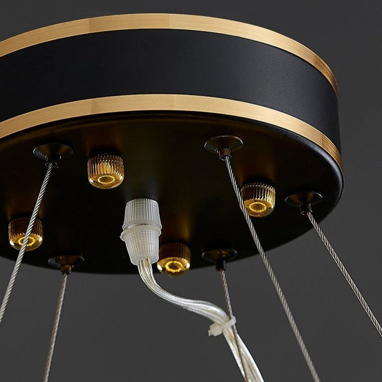 Close up of ceiling mount and suspension cables on Sagres circular crystal chandelier