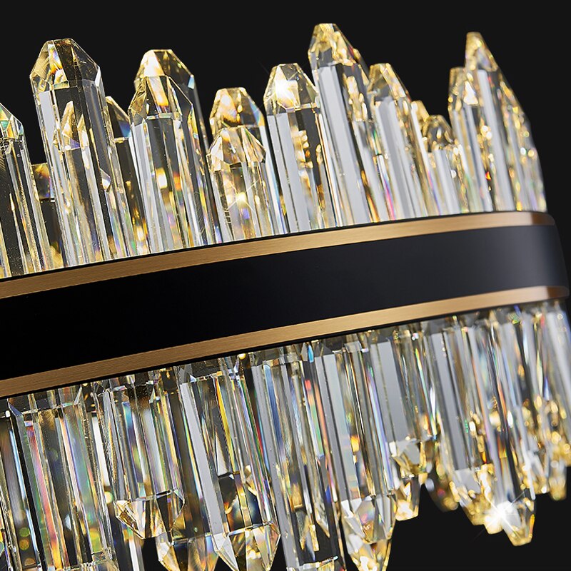 Detailed view of circular frame and layered crystal band on Sagres chandelier