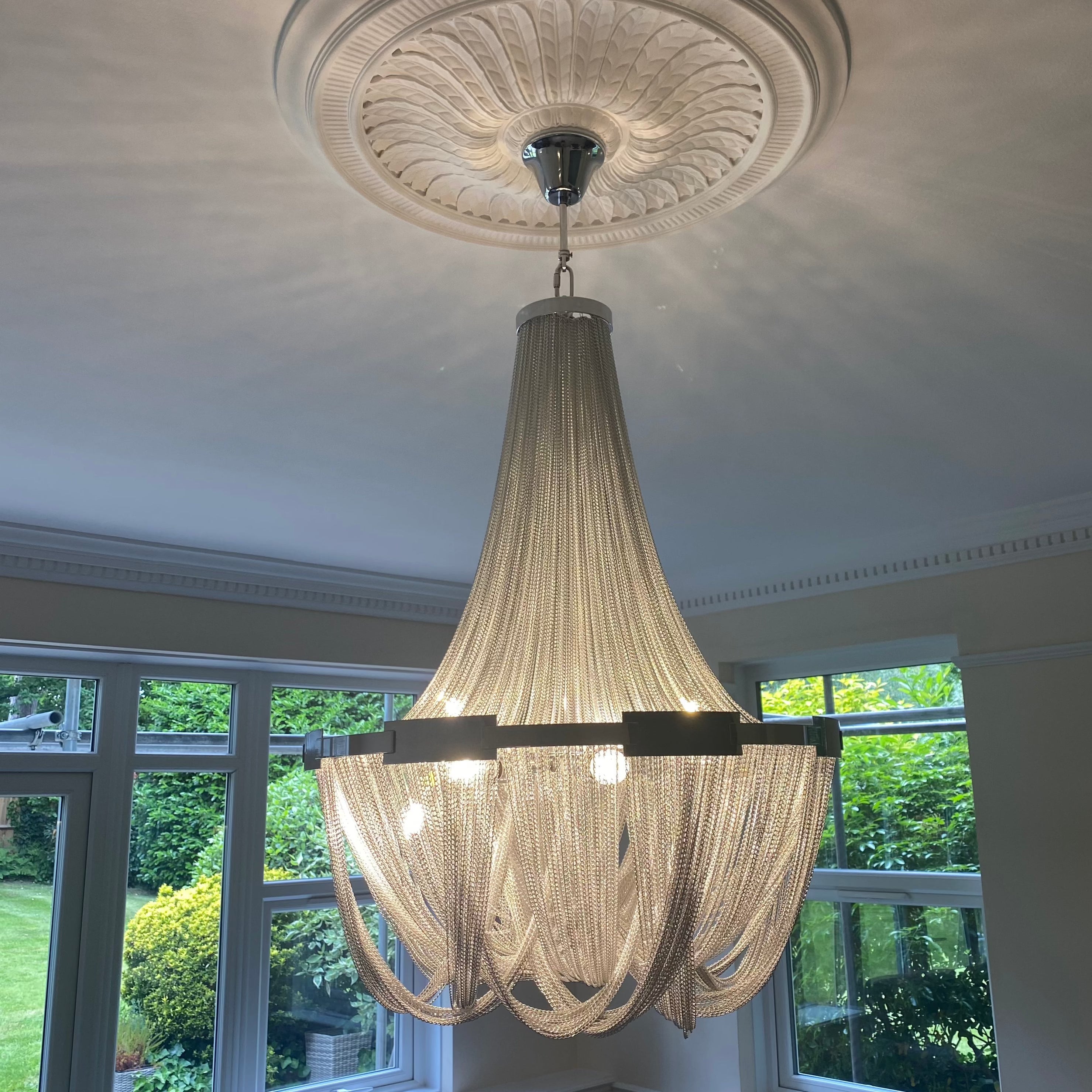 Adlington Grandeur chandelier ceiling plate detail showing refined installation and premium finish for luxury interiors
