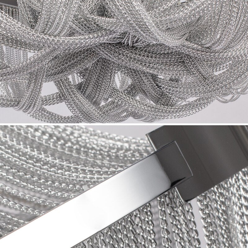 Close-up of the Adlington Grandeur chandelier showcasing flowing crystal chain detailing and sculptural form