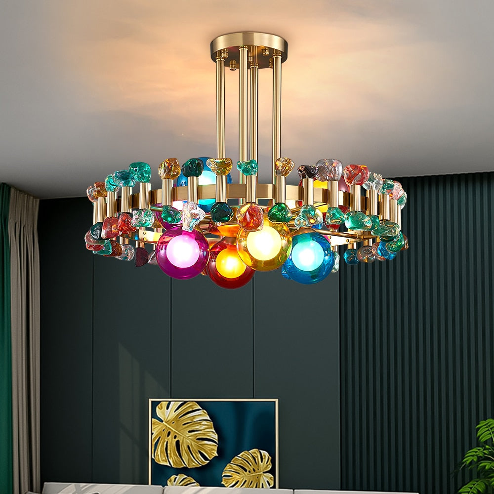 Alytus pendant light featuring multicolour crystals in a dark interior, delivering a bold and playful statement.