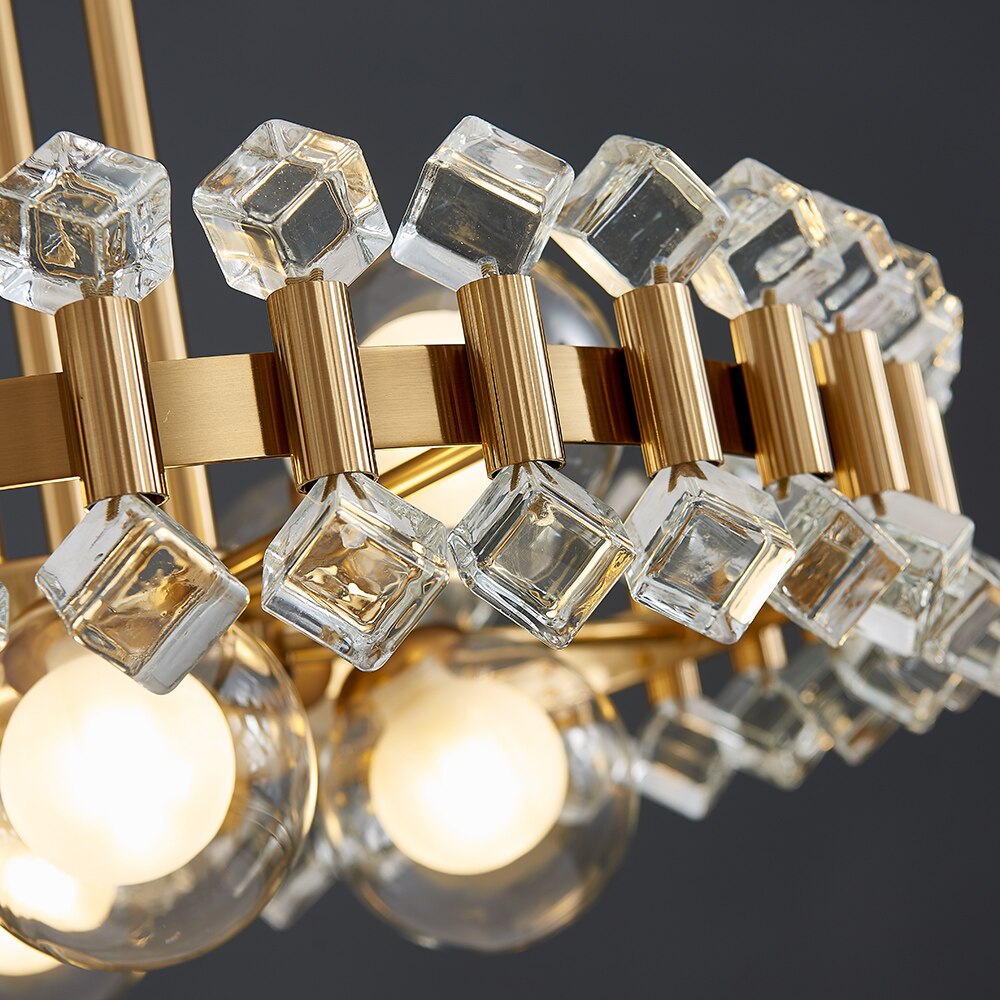 Close-up of the Alytus pendant showing red, green, blue and amber crystal cubes on gold frame.