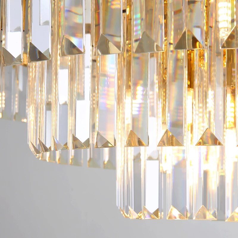 Detailed shot of multi-tier crystal bars showcasing the chandelier’s refined craftsmanship.