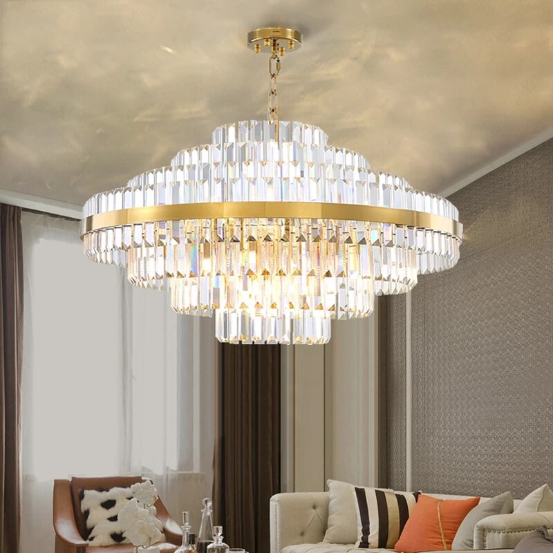 Luxury circular chandelier with layered crystal bars illuminating a modern living space.