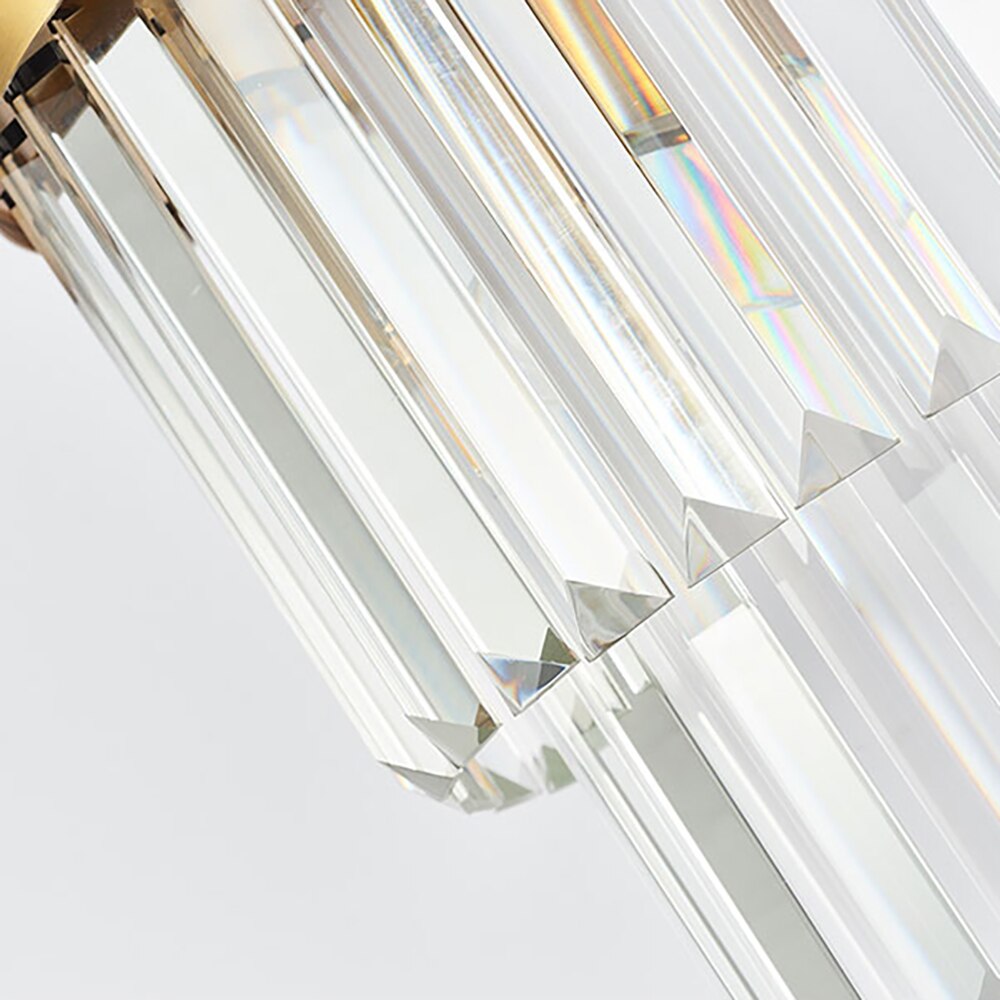 Close-up of layered crystal bars with refined detailing on the Belair wall light.