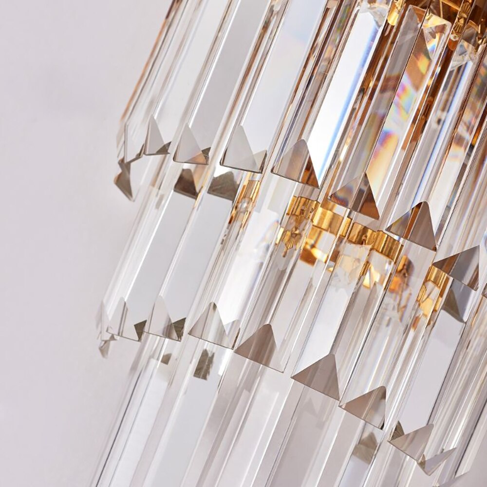 Detailed view of crystal bars and gold accents on the Boeotia Double Wall Light.