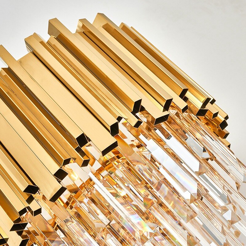 Close-up of the Boeotia Floor Lamp’s sleek gold cuboid tubing.