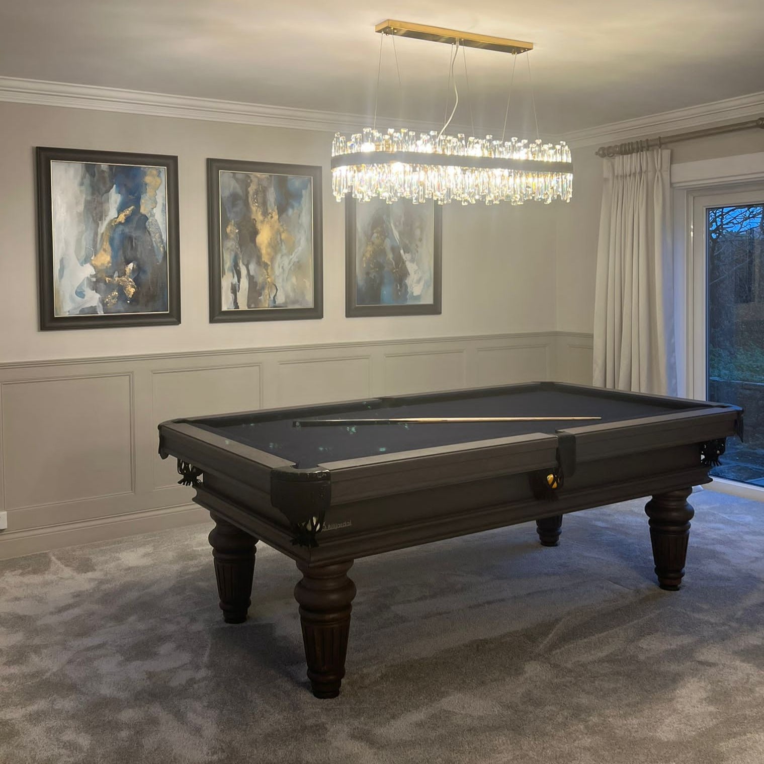 Brighouse Rectangular Chandelier creating a refined focal point above a luxury games room.